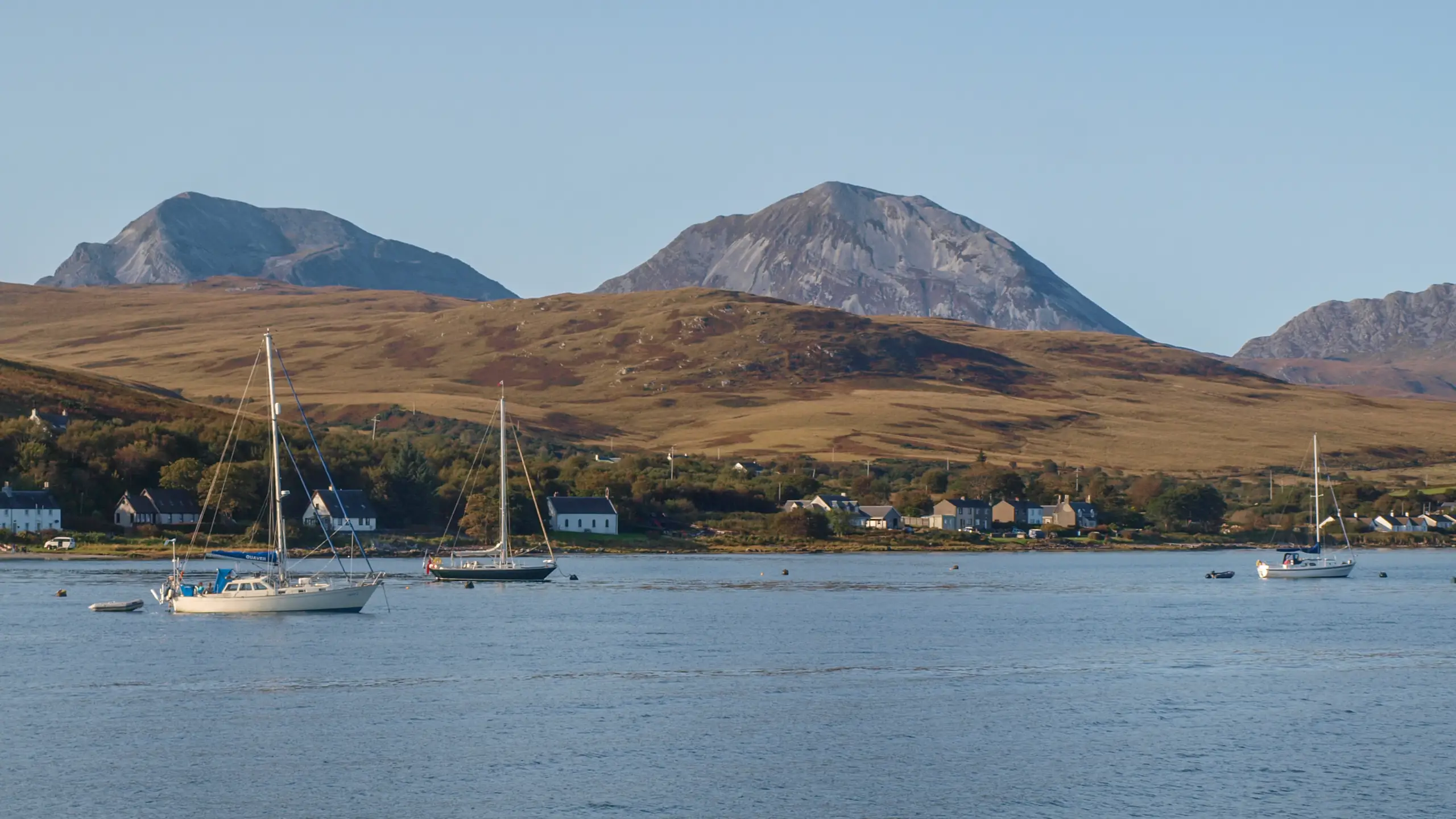 The moorings overlooked by the Paps