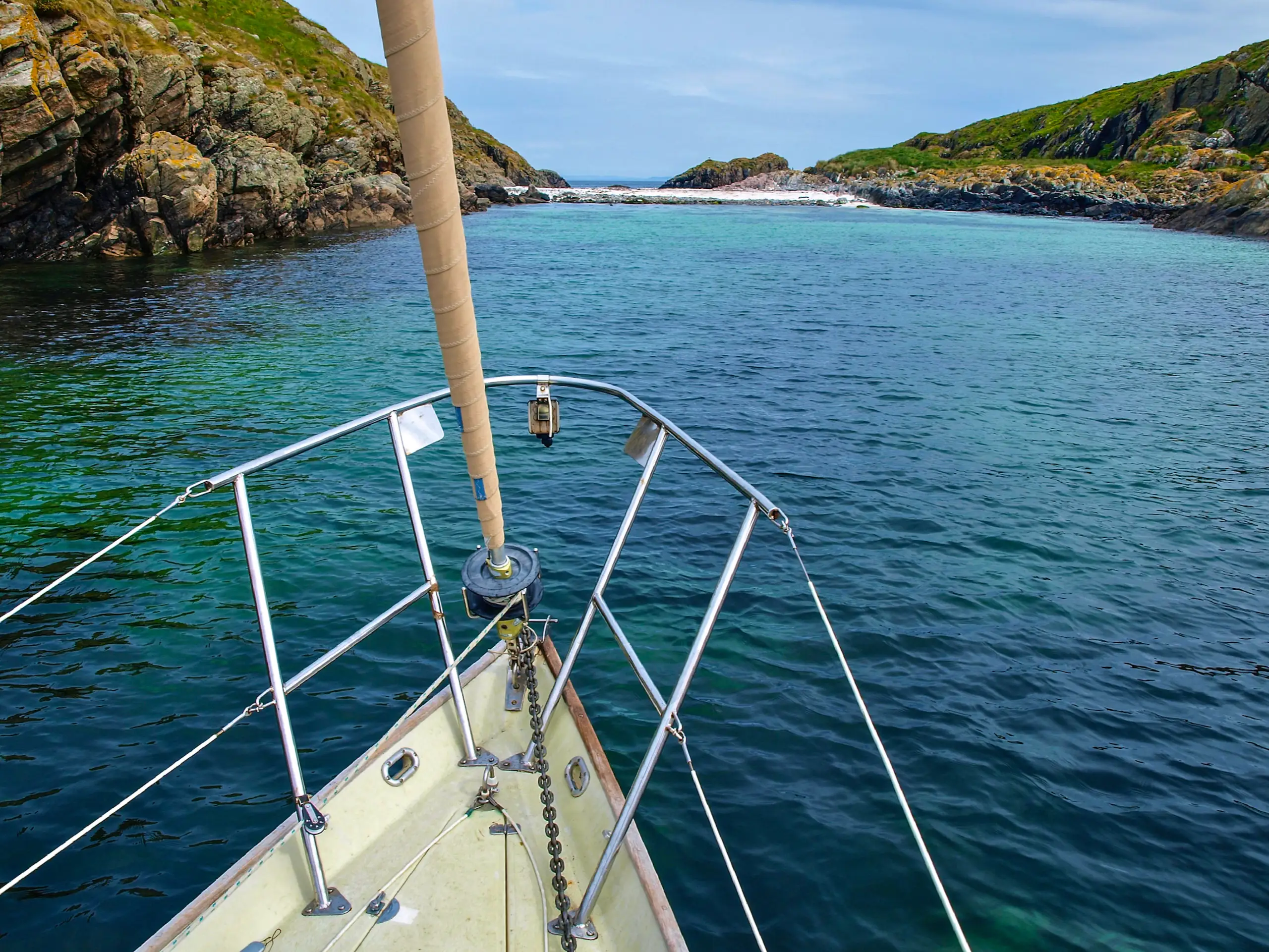At anchor pointing towards the beach