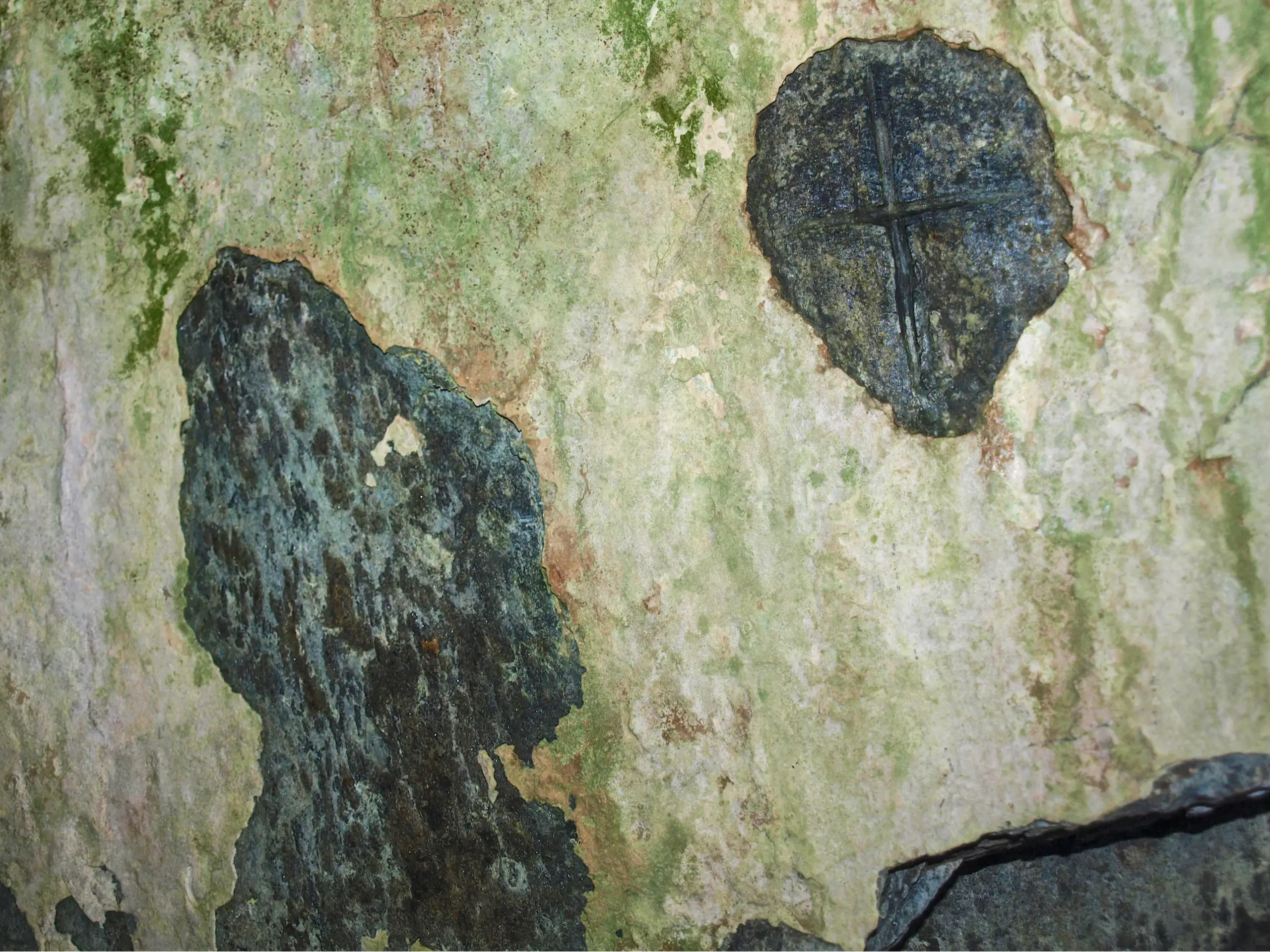 The carved cross in the cave