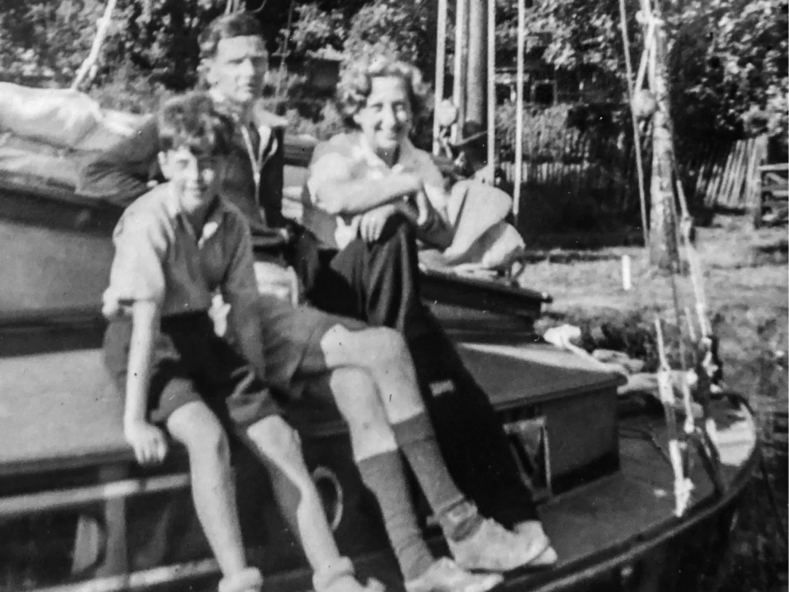 Family holidays on the Norfolk Broads, me on the left with my father and mother